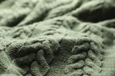 Örülmüş yumuşak yün kumaş, yakın plan görünüm.