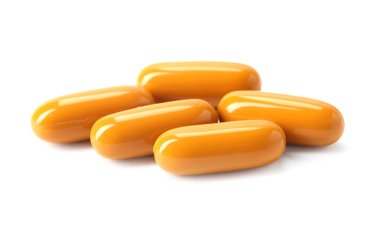 Kolajen kapsülleri beyaza izole edilmiş. Beslenme takviyesi