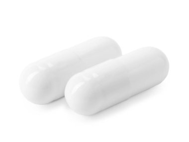 Kolajen kapsülleri beyaza izole edilmiş. Beslenme takviyesi