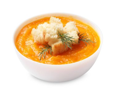 Lezzetli balkabağı kremalı çorba, kıtır ekmekli ve dereotlu beyaz tencere.