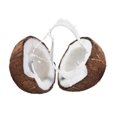 Olgun hindistan cevizi ve beyaz arka planda sütün yarısı.