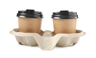 Paper coffee cups in cardboard holder isolated on white