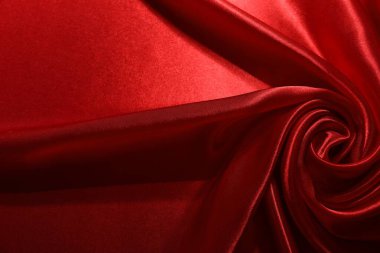 Arkaplan olarak kırmızı buruşuk ipek kumaş, üst görünüm