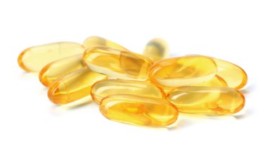 Kolajen kapsülleri beyaza izole edilmiş. Beslenme takviyesi