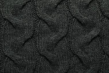 Arka plan olarak örülmüş gri yün kumaş, üst görünüm