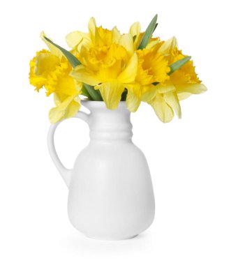 Beyaz vazodaki sarı nergisler