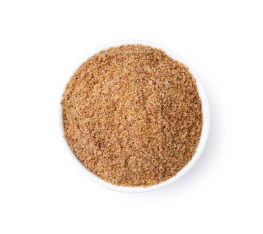 Süper gıda ürünü. Kasedeki keten tohumu tozu beyaza izole edilmiş, üst manzara