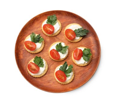 Krem peynirli, domatesli ve maydanozlu leziz krakerler.