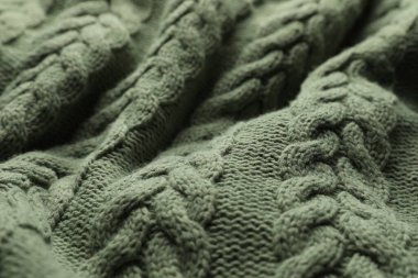 Örülmüş yumuşak yün kumaş, yakın plan görünüm.