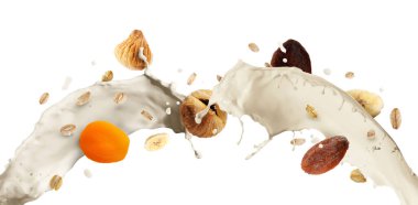 Süt, yulaf ezmesi ve beyaz arka planda kuru meyveler. Sağlıklı kahvaltı.