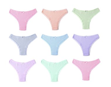 Beyaz arka planda farklı renklerde güzel kadın külotu, set