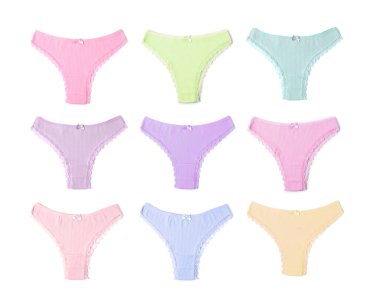 Beyaz arka planda farklı renklerde güzel kadın külotu, set