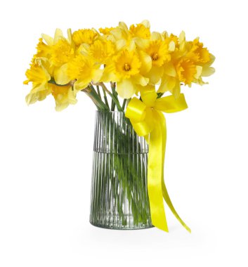 Beyaz vazodaki sarı nergisler