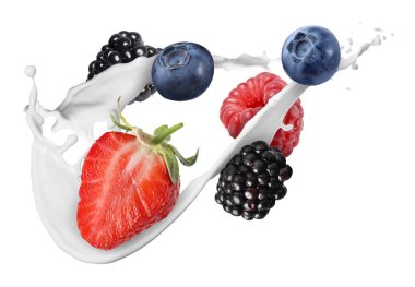 Süt sıçraması ve beyaz arka planda farklı taze meyveler.