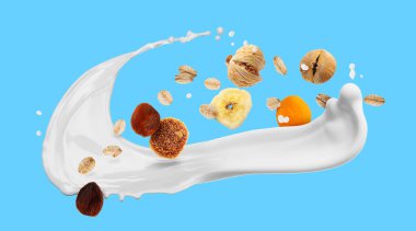 Süt sıçraması, yulaf ezmesi ve açık mavi arka planda kurutulmuş meyve. Pankart tasarımı