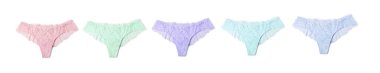 Beyaz arka planda farklı renklerde güzel kadın külotu, set