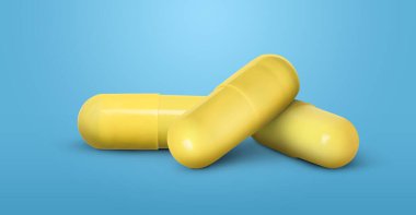 Antibiyotik hapları. Açık mavi arka planda sarı kapsüller. Pankart tasarımı