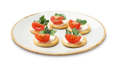 Krem peynirli, domatesli ve maydanozlu leziz krakerler.