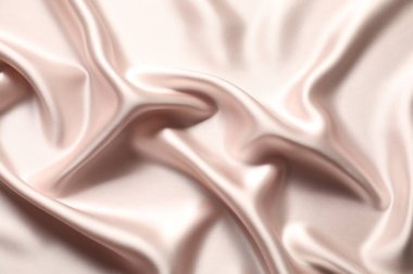 Arkaplan olarak bej buruşuk ipek kumaş, üst görünüm