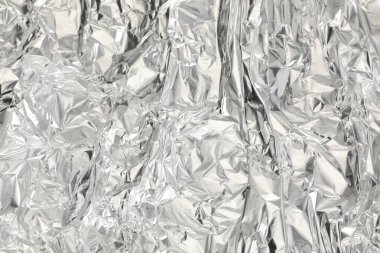 Arkaplan olarak buruşmuş alüminyum folyo, üst görünüm