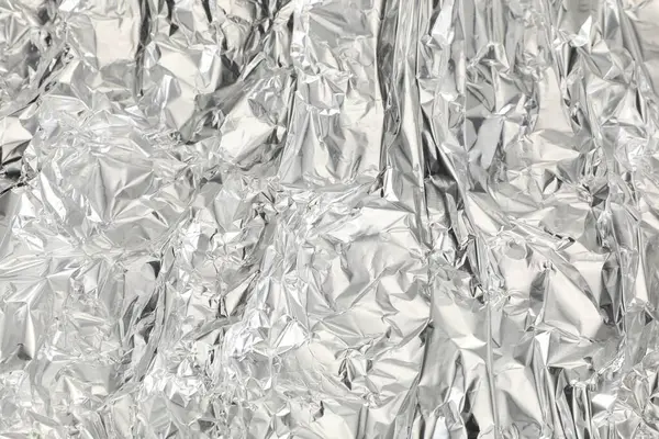 Arkaplan olarak buruşmuş alüminyum folyo, üst görünüm