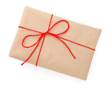 Kraft kağıdına sarılmış beyaz yay ile izole edilmiş, üst görünüm