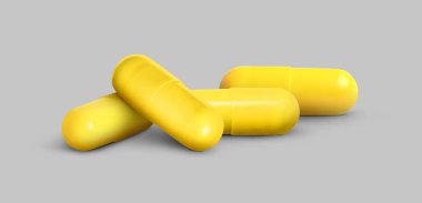 Antibiyotik hapları. Gri arka planda sarı kapsüller. Pankart tasarımı