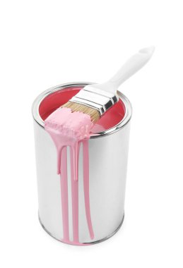 Can of pink paint and brush isolated on white