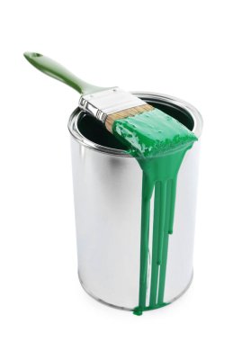 Can of green paint and brush isolated on white