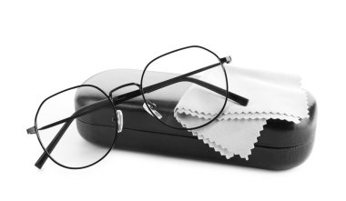 Case with stylish glasses and cleaning cloth isolated on white