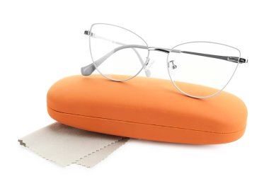 Case with stylish glasses and cleaning cloth isolated on white