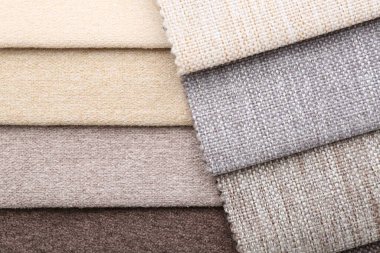 Arka plan olarak farklı kumaş örnekleri, üst görünüm