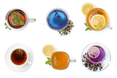 Beyaza izole edilmiş bardaklardaki farklı çay çeşitleri. Üst görünüm