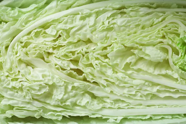 Arka plan olarak taze yeşil Çin lahanası, yakın plan.