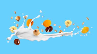 Süt sıçraması, yulaf ezmesi ve açık mavi arka planda kurutulmuş meyve. Pankart tasarımı