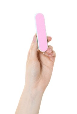 Beyaz arka planda tampon bloğu olan kadın, yakın plan. Manikür aracı