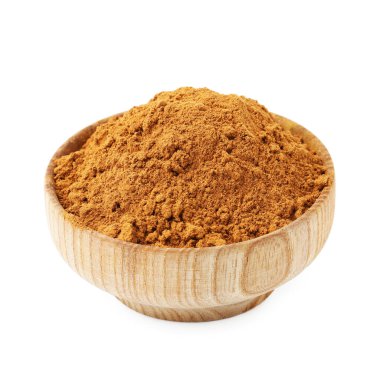 Süper yemek. Beyaz kasede izole edilmiş tarçın tozu.