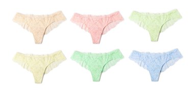 Beyaz arka planda farklı renklerde güzel kadın külotu, set