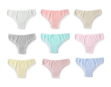 Beyaz arka planda farklı renklerde güzel kadın külotu, set