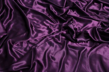 Arka plan olarak lüks mor ipek çarşaflar, üst görünüm