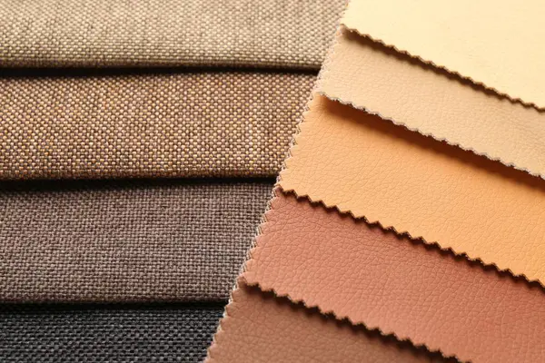 Arka plan olarak farklı kumaşlardan örnekler, yakın plan