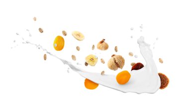 Süt, yulaf ezmesi ve beyaz arka planda kuru meyveler. Sağlıklı kahvaltı.