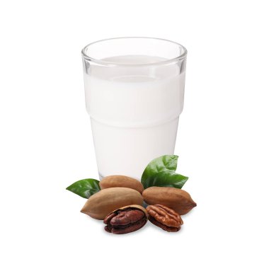 Bardakta fındık sütü ve beyaz cevizler.