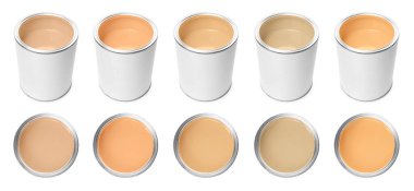 Beyaz teneke kutulardaki farklı pastel boyalar, set. Üst ve yan görünüm