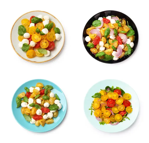 Beyaz arka planda sarı ve kırmızı domatesli lezzetli taze salatalar. Üst görünüm