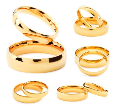 Beyaz arka planda parlak altın alyanslar, kolaj