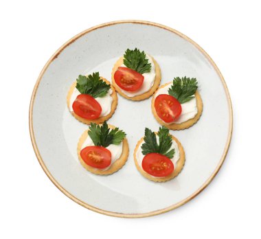 Krem peynirli, domatesli ve maydanozlu leziz krakerler.