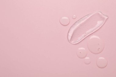 Pembe arka planda kolajen jel, üst manzara. Metin için boşluk