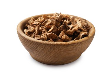 Beyaz kabın içindeki kuru hindiba kökleri.