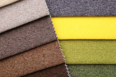 Arka plan olarak farklı kumaş örnekleri, üst görünüm